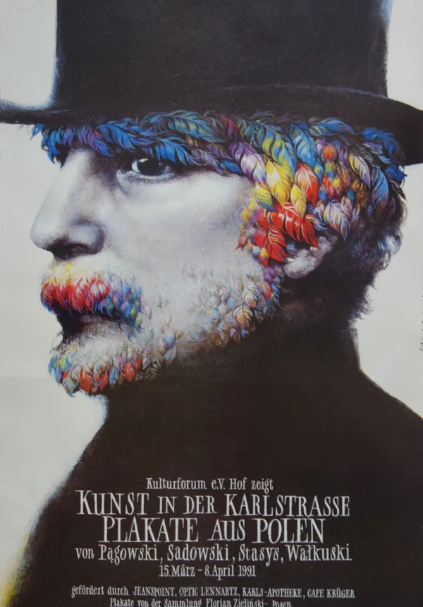 Bearded man in top hat, with hair and beard made of rainbow colored feathers.